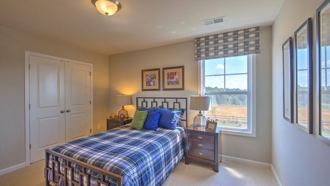 Furnished interior view inside a new home in Reserve at Tap Root Farms, Fletcher (Image 40).