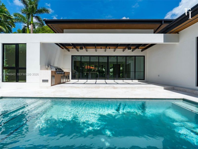 Exterior details and patio area of a home in , Coral Gables (Image 28). Exterior details and patio area of a home in , Coral Gables (Image 28).