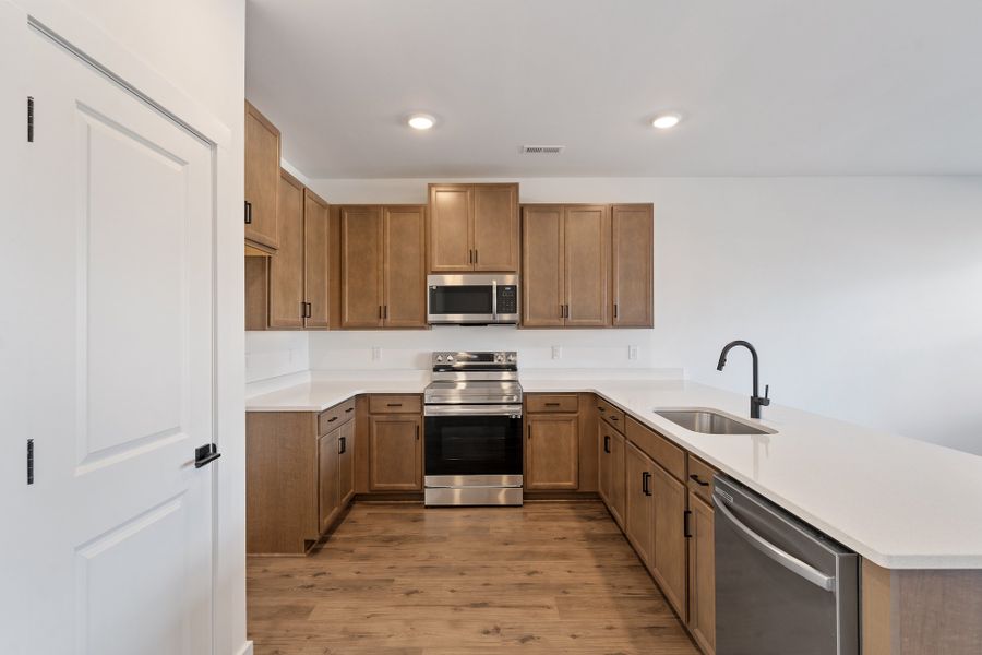 Representative furnished interior of a home built from the Glover by Hunter Quinn Homes in Westgate Village Townes, Spartanburg (Image 8). Representative furnished interior of a home built from the Glover by Hunter Quinn Homes in Westgate Village Townes, Spartanburg (Image 8).