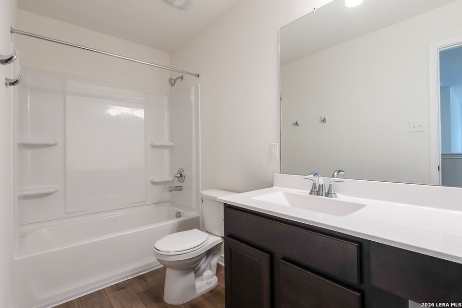 Furnished interior view inside a new home in Woodside Farms, Seguin (Image 5).
