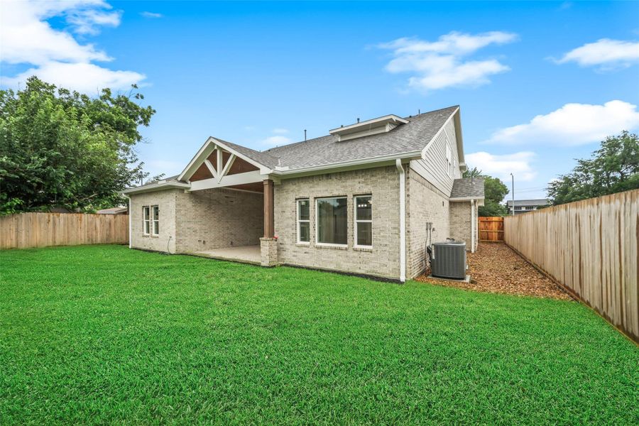 Exterior details and patio area of a home in , Houston (Image 4).