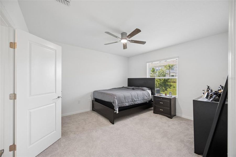 Furnished interior view inside a new home in Westview Community Group Page, Kissimmee (Image 6).