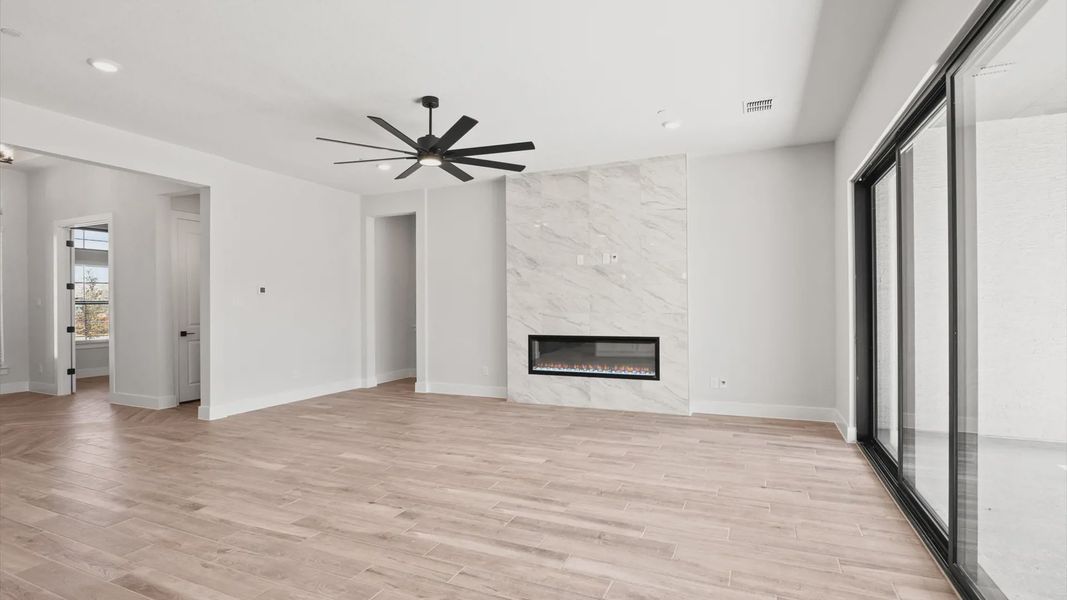 Representative unfurnished interior of a home built from the Raegan by Chesmar Homes in Sweetwater, Austin (Image 11). Representative unfurnished interior of a home built from the Raegan by Chesmar Homes in Sweetwater, Austin (Image 11).