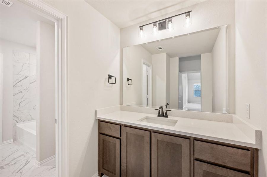Furnished interior view inside a new home in Creekview Meadows, Pilot Point (Image 18).