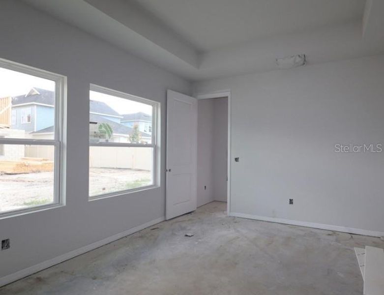 In-progress construction of a new home in Oakfield at Mount Dora Cottage Series, Mount Dora, FL (Image 6).