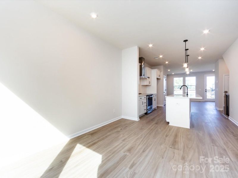 Functional Flow From Dining Space to Kitchen.