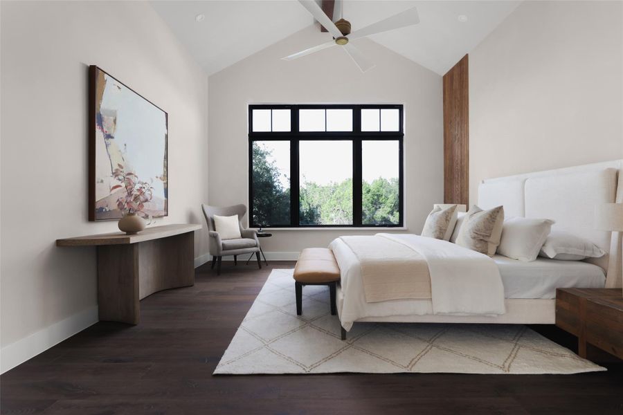 A sanctuary on the main level. The primary suite is a true retreat, featuring vaulted ceilings and a private wall of windows that look out over the 1.06-acre greenbelt. It’s positioned away from the guest wings, offering a quiet, light-filled space to start and end the day in total privacy.