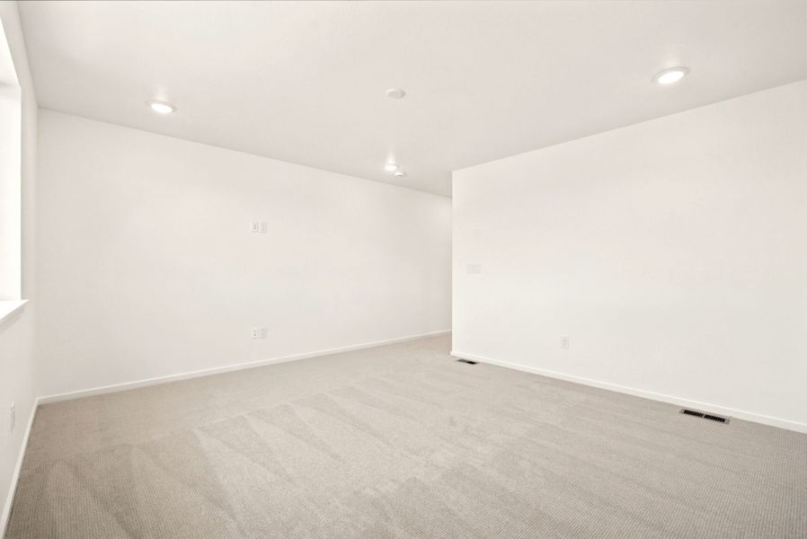 Spacious, unfurnished interior of a new home in Cordovan, Firestone (Image 22).