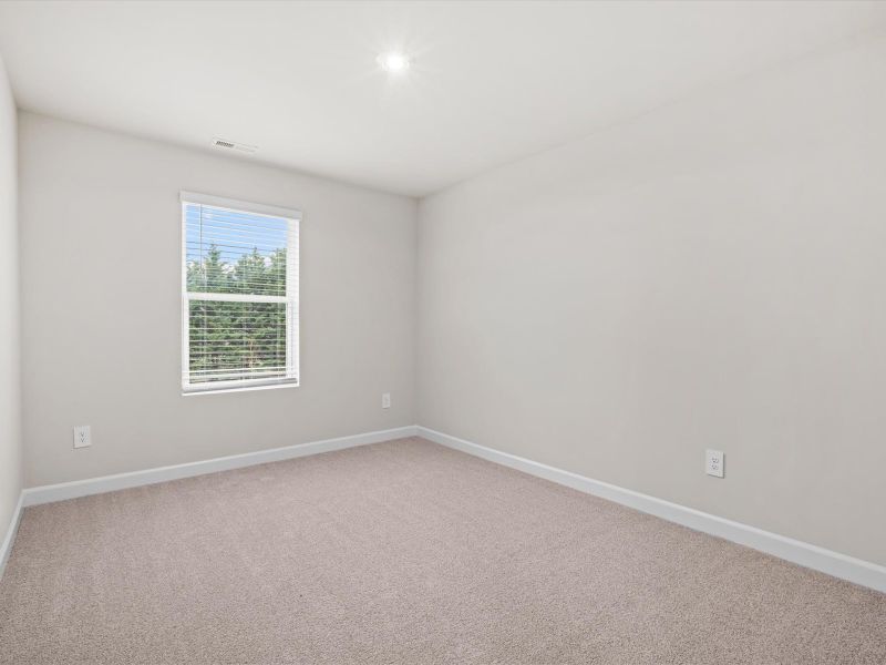 Spacious, unfurnished interior of a new home in Crossing at Abner Creek Townes, Greer (Image 18).