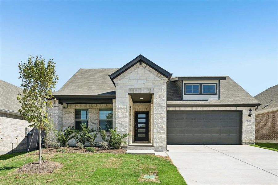 Front exterior of a new home in Tesoro at Chisholm Trail Ranch, Fort Worth, TX, highlighting curb appeal (Image 1).