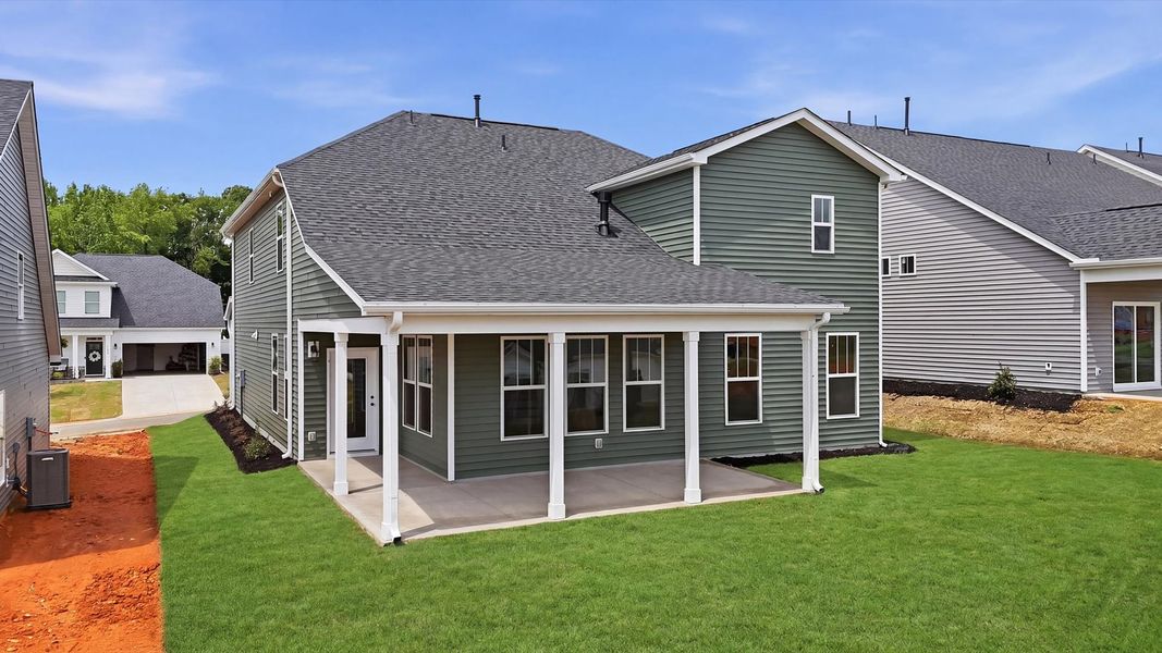 Tasteful rear porch provides a peaceful retreat and effortless indoor-outdoor flow at the Iris Meadows community