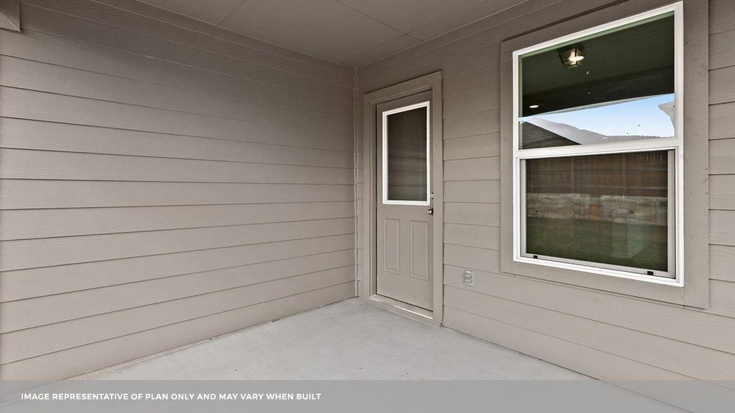 Exterior details and patio area of a home in Carillon, Manor (Image 16).