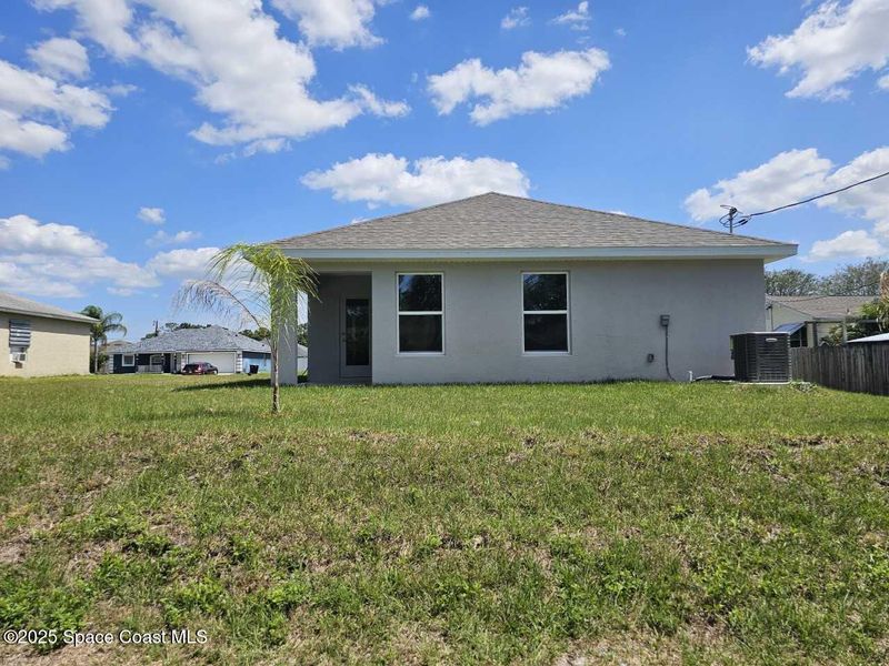 Exterior details and patio area of a home in Palm Bay, Palm Bay (Image 2).