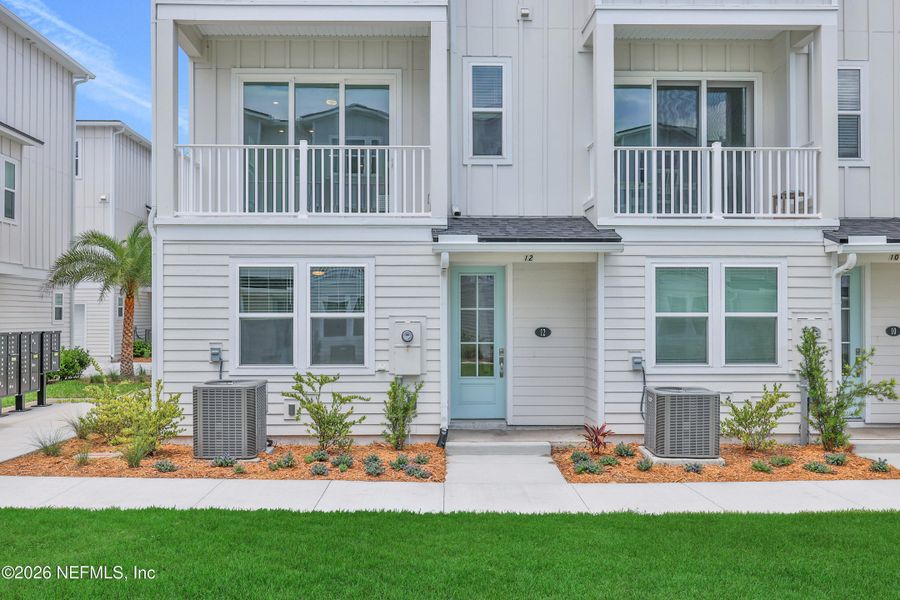 Exterior details and patio area of a home in North Beach Townhomes, Jacksonville Beach (Image 25). Exterior details and patio area of a home in North Beach Townhomes, Jacksonville Beach (Image 25).