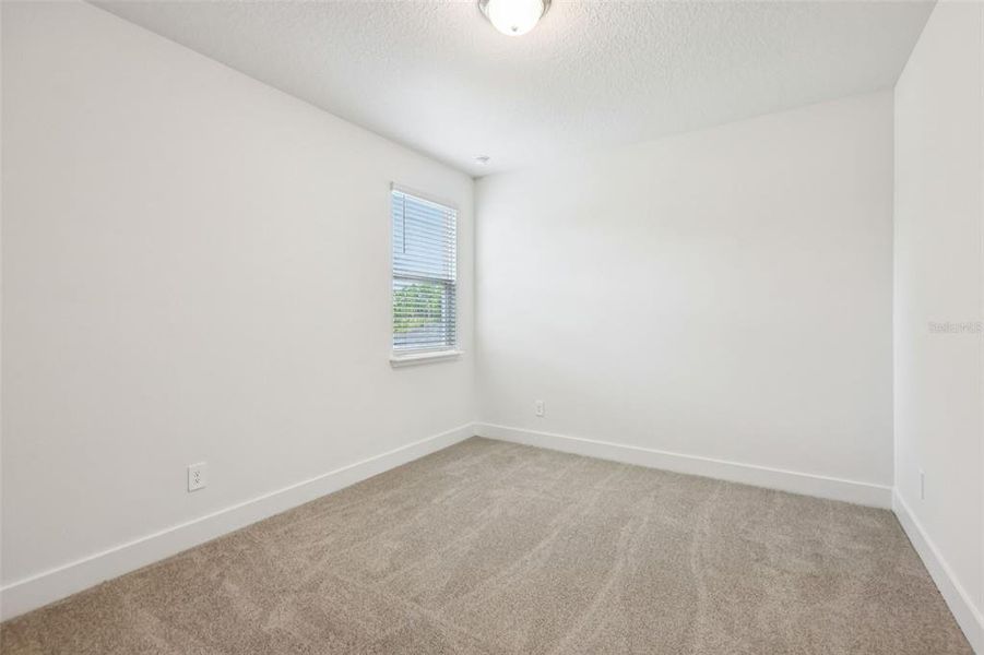 Spacious, unfurnished interior of a new home in Ridgehaven - Signature Series, Ormond Beach (Image 22).