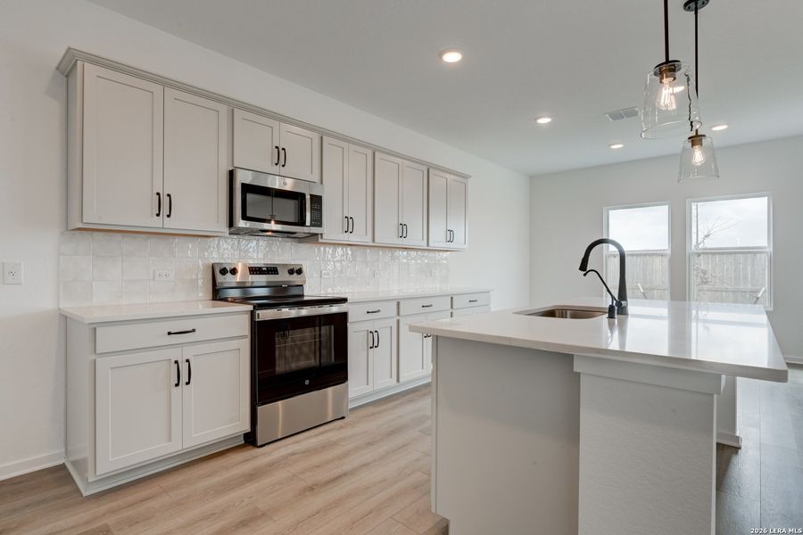 Furnished interior view inside a new home in Hennersby Hollow, San Antonio (Image 6).