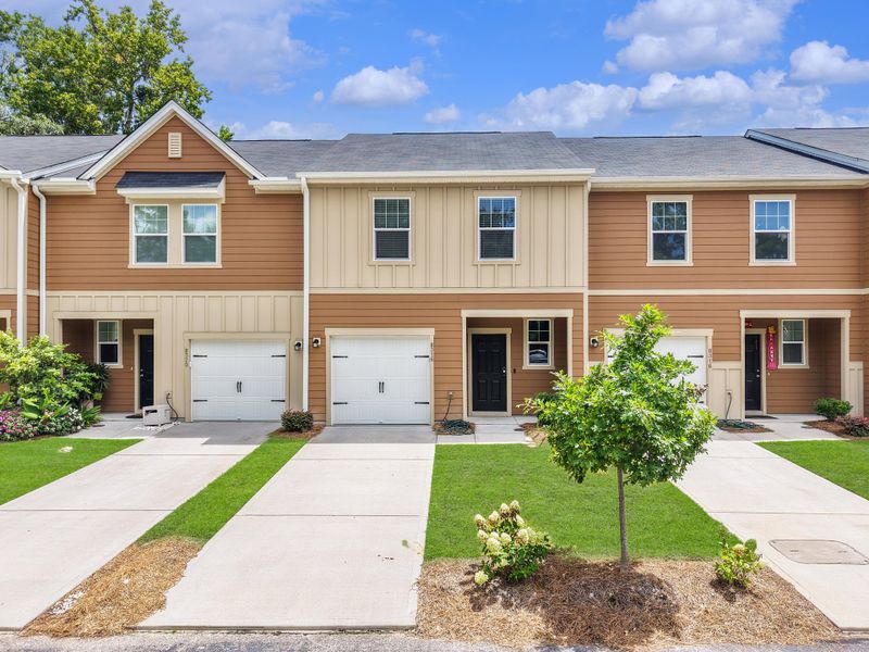 Front exterior of a new home in , North Charleston, SC, highlighting curb appeal (Image 2).