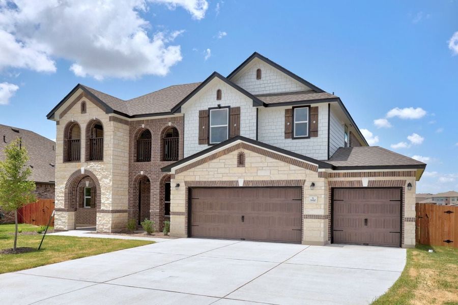 Front exterior of a new home in Salerno - Hallmark Collection, Round Rock, TX, highlighting curb appeal (Image 22).