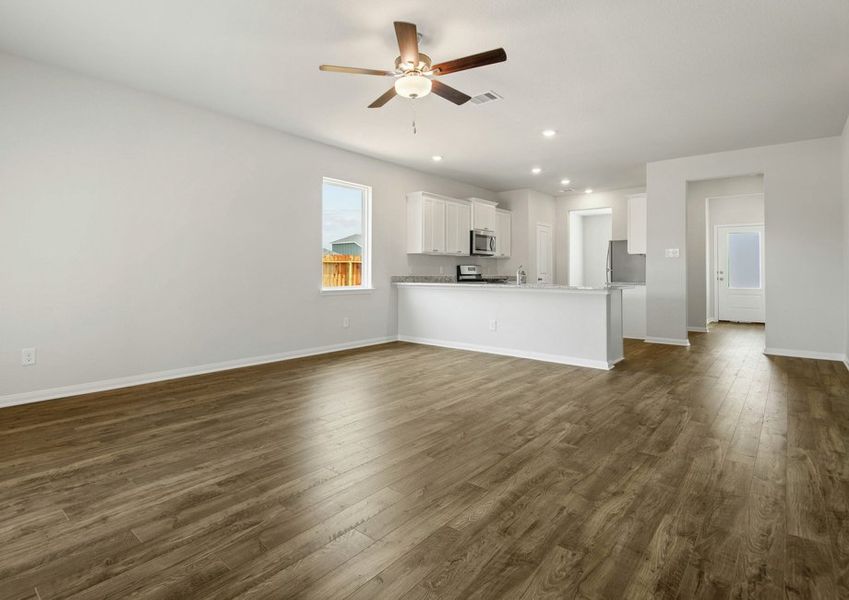 Spacious family room and adjoining kitchen