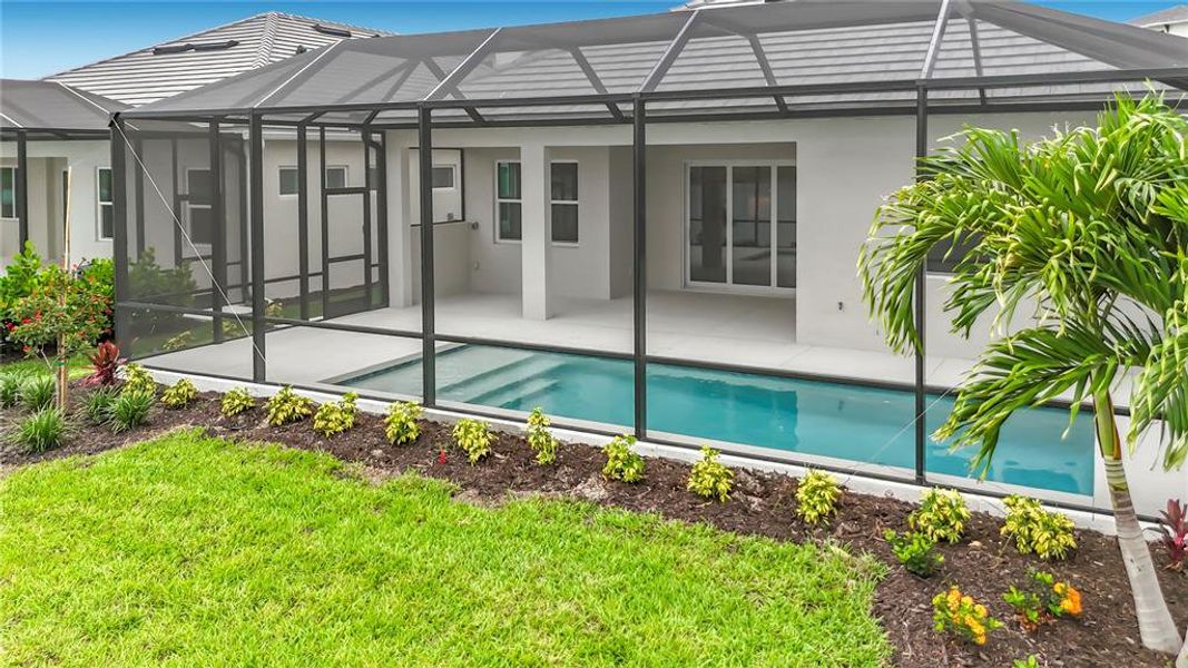 Exterior details and patio area of a home in Watercolor Place, Bradenton (Image 27).
