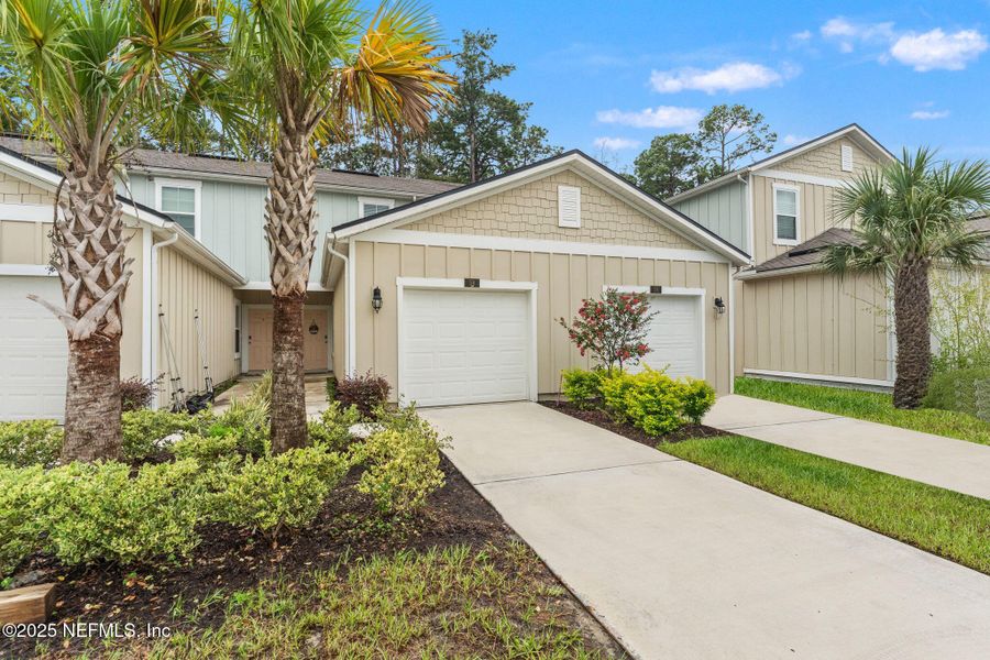 Front exterior of a new home in , St. Augustine, FL, highlighting curb appeal (Image 20).