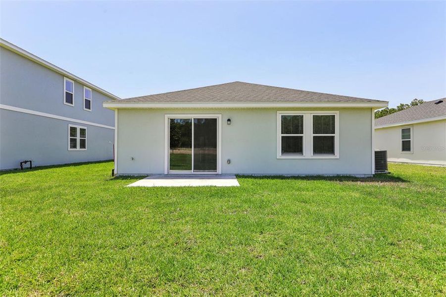 Exterior details and patio area of a home in Flagler Village - Classic Series, Palm Coast (Image 16).