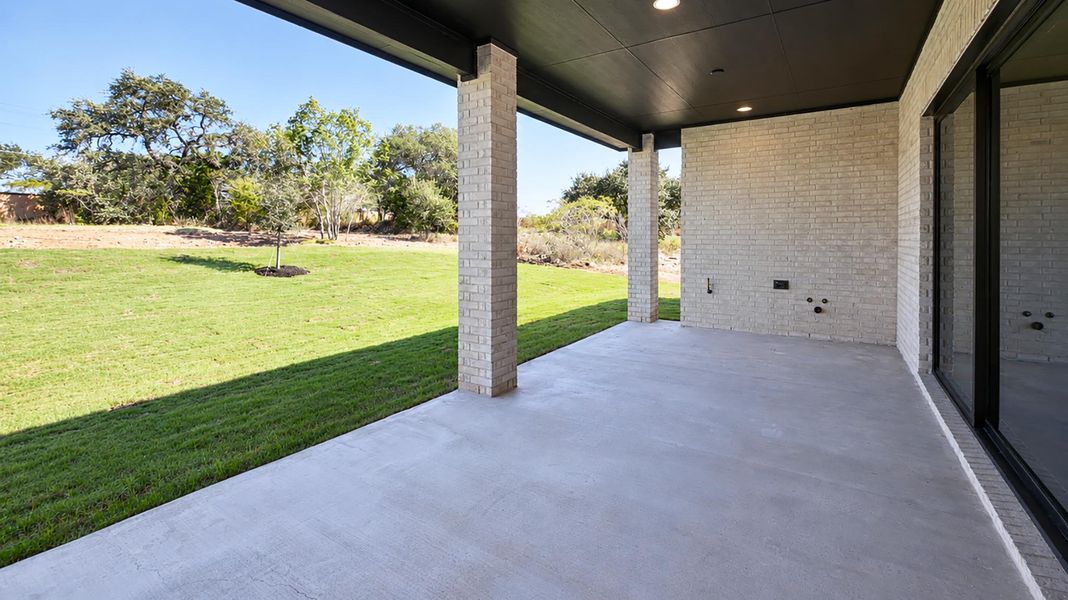 Exterior details and patio area of a home in Creek of Driftwood, Driftwood (Image 3). Exterior details and patio area of a home in Creek of Driftwood, Driftwood (Image 3).