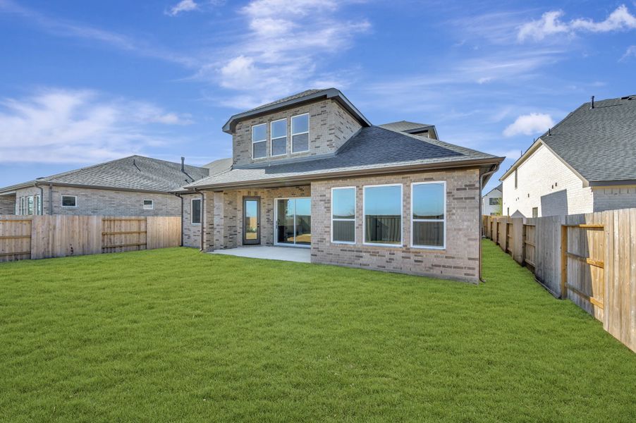 Exterior details and patio area of a home in Brookewater - Ascent Collection, Rosenberg (Image 3). Exterior details and patio area of a home in Brookewater - Ascent Collection, Rosenberg (Image 3).