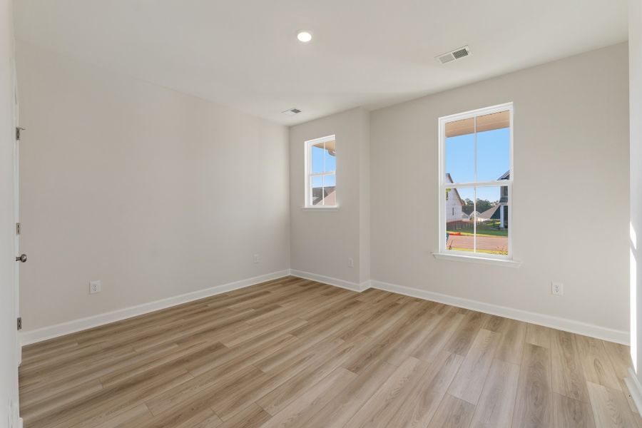 Spacious, unfurnished interior of a new home in Cottages at Lake Emory, Inman (Image 22). Spacious, unfurnished interior of a new home in Cottages at Lake Emory, Inman (Image 22).