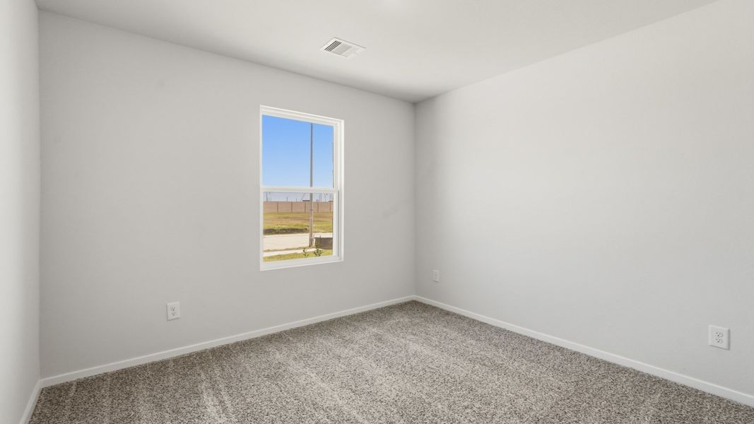 Spacious, unfurnished interior of a new home in Sunterra, Katy (Image 22).