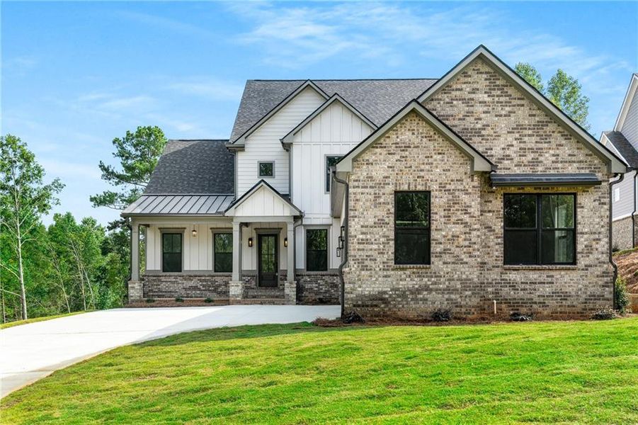Front exterior of a new home in , Jefferson, GA, highlighting curb appeal (Image 23).