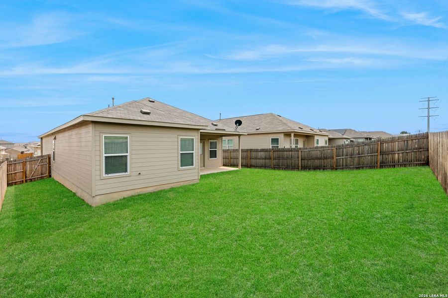 Exterior details and patio area of a home in Hidden Trails, Bulverde (Image 3).