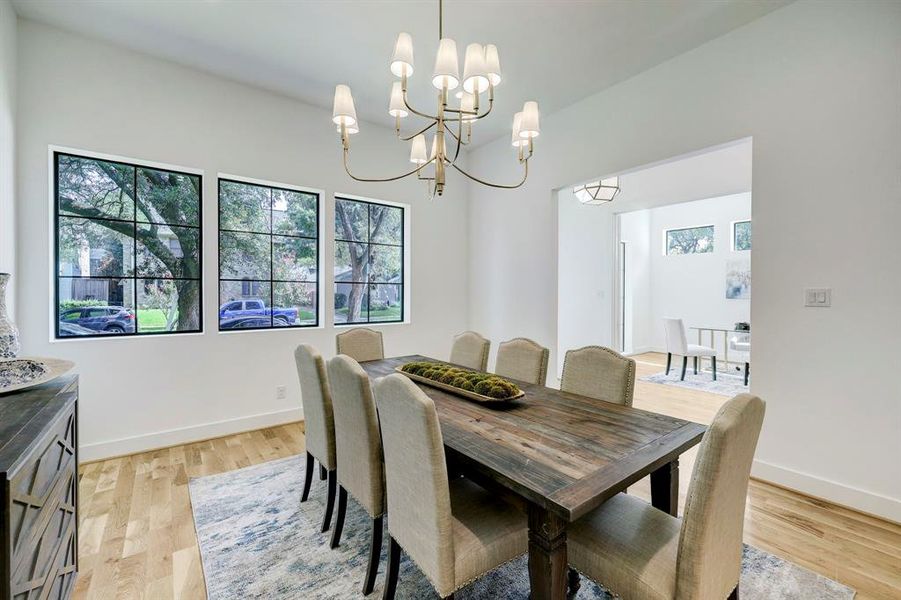 Spacious dining room with abundant natural light and designer finishes