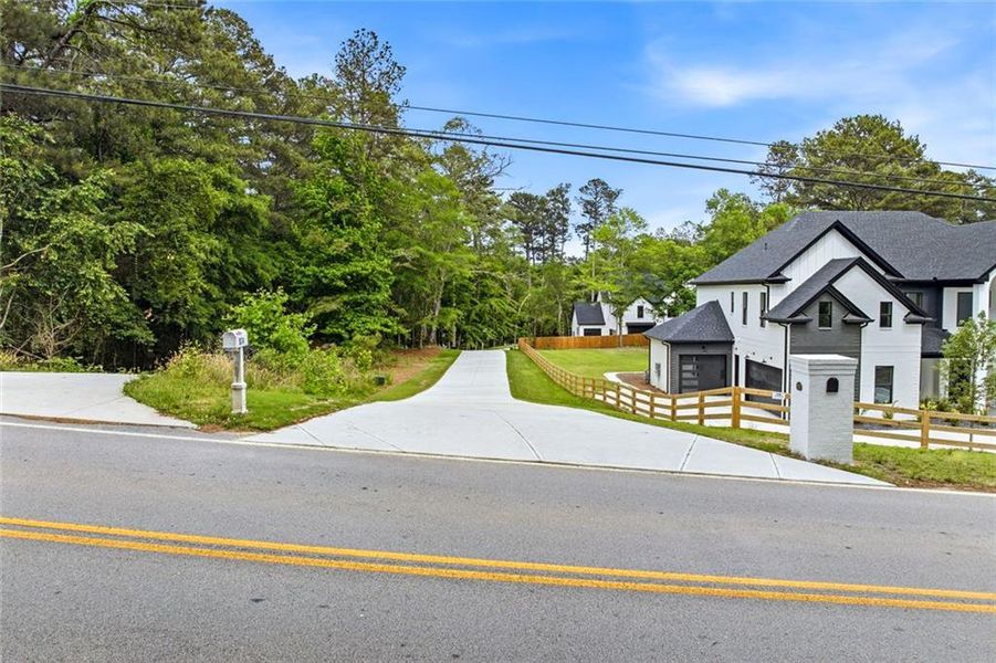 Front exterior of a new home in , Lawrenceville, GA, highlighting curb appeal (Image 29).