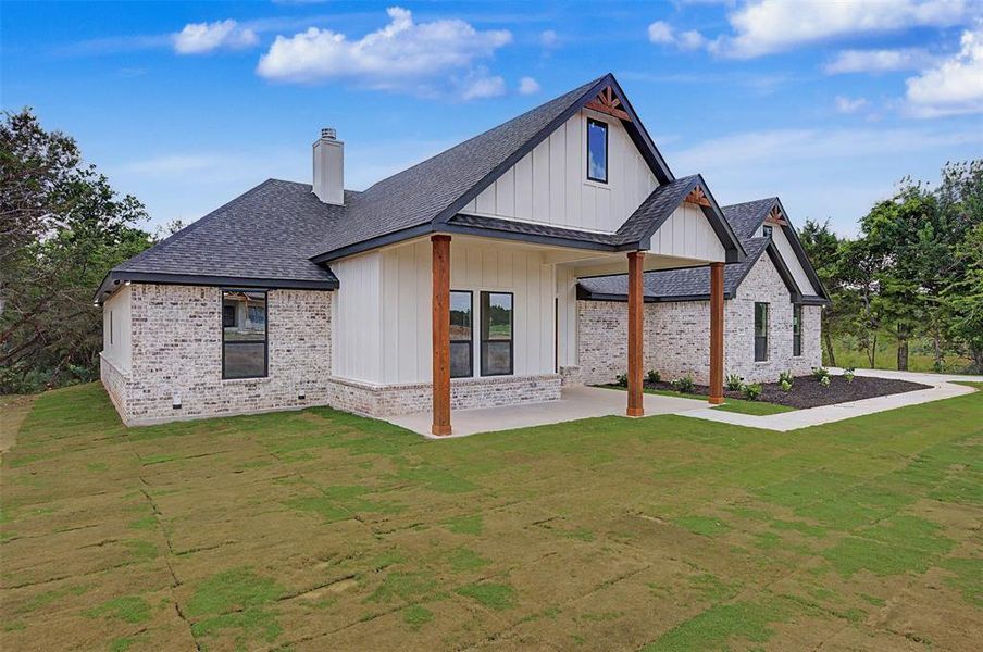 Front exterior of a new home in , Rio Vista, TX, highlighting curb appeal (Image 24). Front exterior of a new home in , Rio Vista, TX, highlighting curb appeal (Image 24).