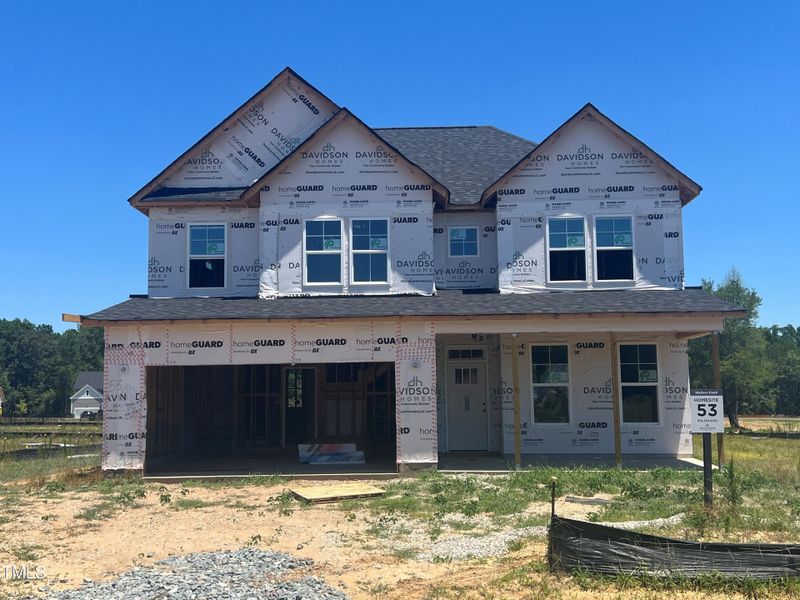 Front exterior of a new home in Wellers Knoll, Lillington, NC, highlighting curb appeal (Image 3).