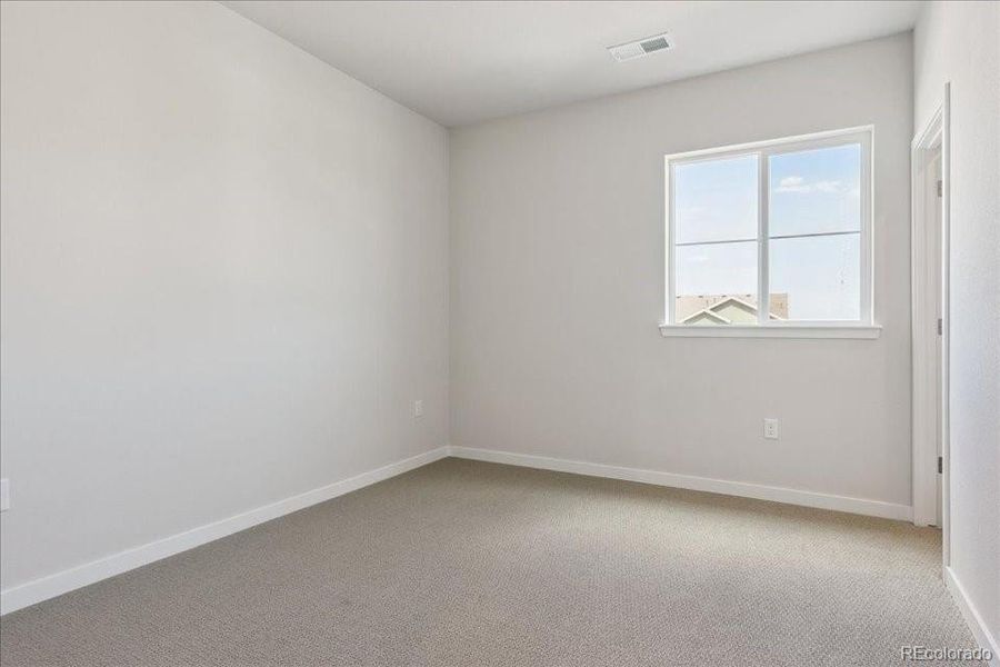 Spacious, unfurnished interior of a new home in Trails at Smoky Hill, Parker (Image 24).