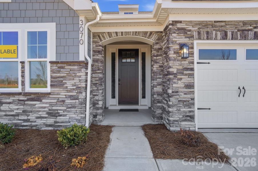 Homesite 4 features an Avery F floorplan