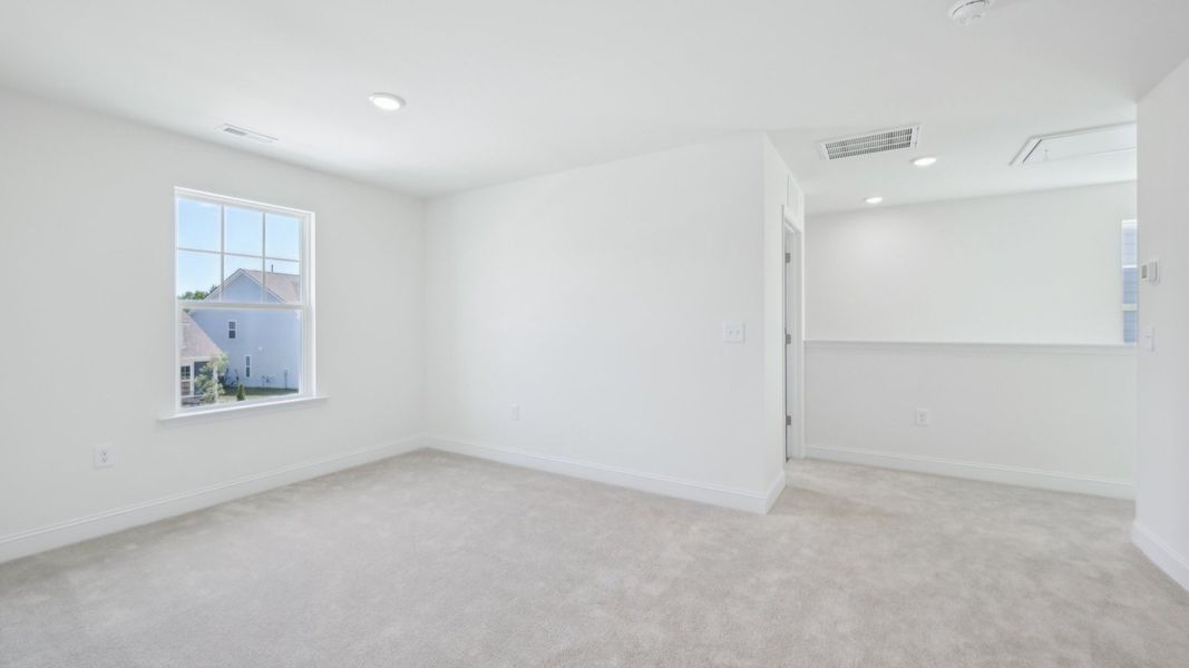 Representative furnished interior of a home built from the Bordeaux by DRB Homes in Sidney Creek Single Family, Zebulon (Image 25).