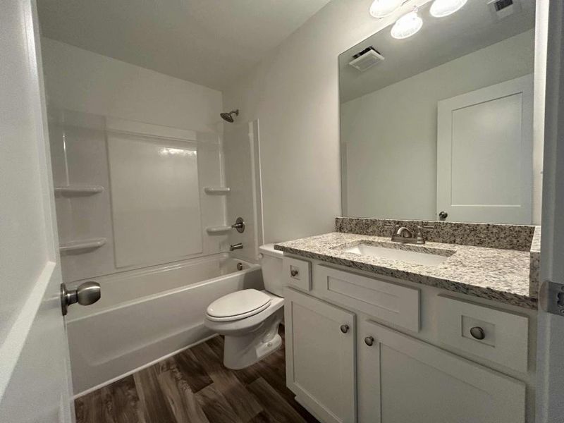 Furnished interior view inside a new home in Sutton's Landing, Statham (Image 4).