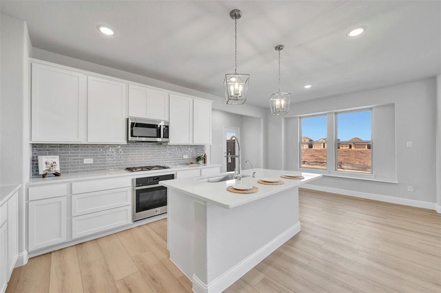 Furnished interior view inside a new home in Lilybrooke at Legacy Hills, Celina (Image 11).