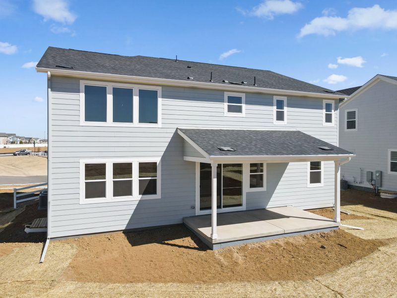 Exterior details and patio area of a home in The Estates Collection at Murphy Creek, Aurora (Image 4).
