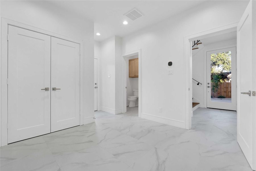 Spacious first-floor en-suite bedroom featuring a separate entrance—ideal for guests, a dedicated office, or potential short-term rental use.