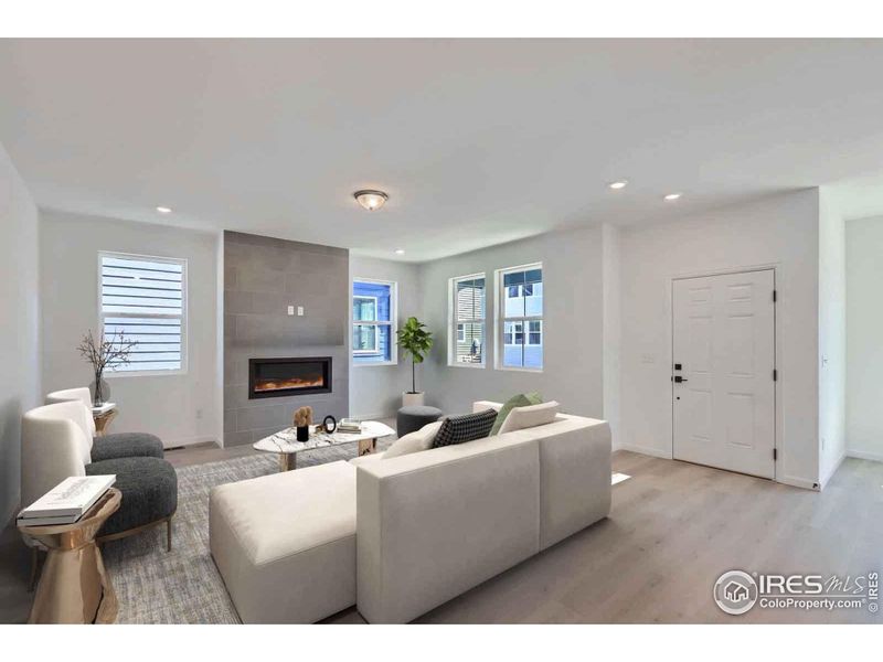 Inviting great room featuring a stunning fireplace