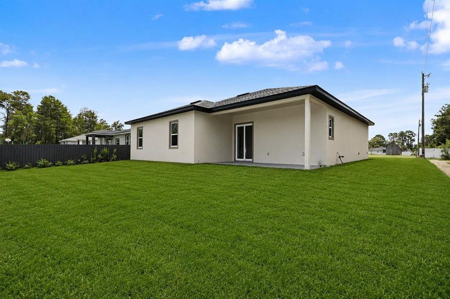 Exterior details and patio area of a home in , Ocala (Image 29).