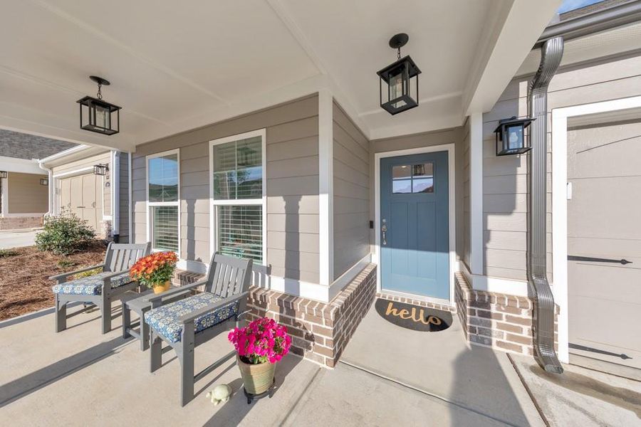 Exterior details and patio area of a home in Madeira, Acworth (Image 26).