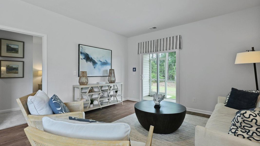 Furnished interior view inside a new home in Pine Hills at Cane Bay, Summerville (Image 7). Furnished interior view inside a new home in Pine Hills at Cane Bay, Summerville (Image 7).