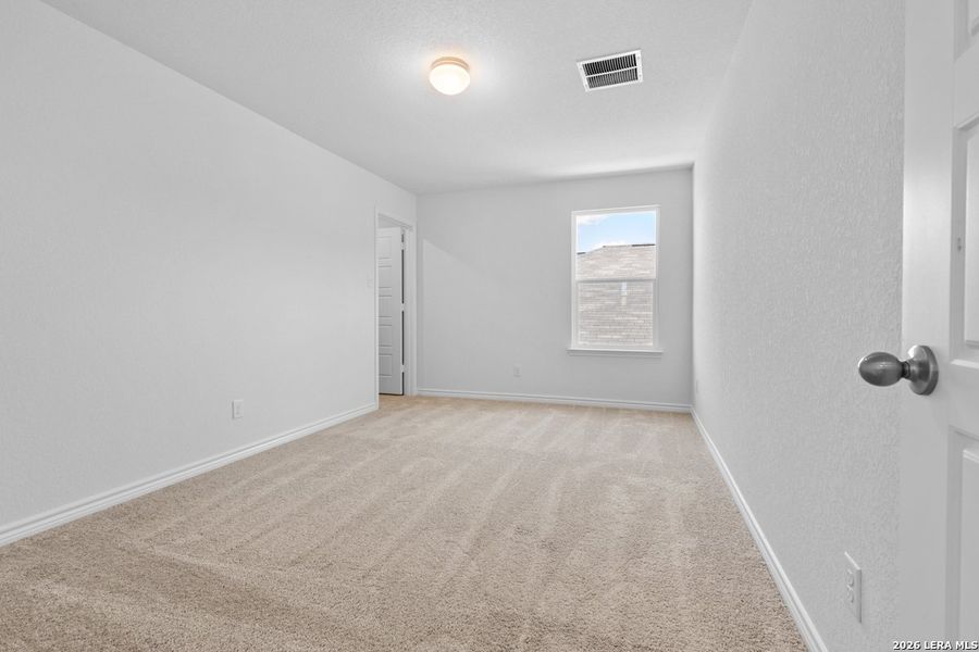 Spacious, unfurnished interior of a new home in Hidden Bluffs at TRP, San Antonio (Image 24).