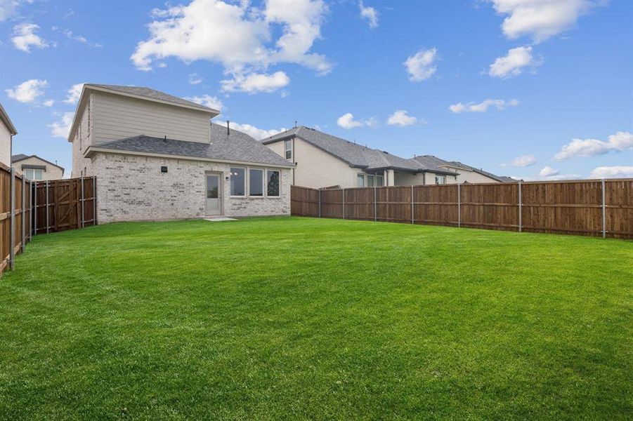 Front exterior of a new home in AnaCapri, Anna, TX, highlighting curb appeal (Image 14).