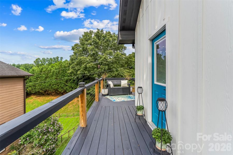 Deck door out of the primary bedroom